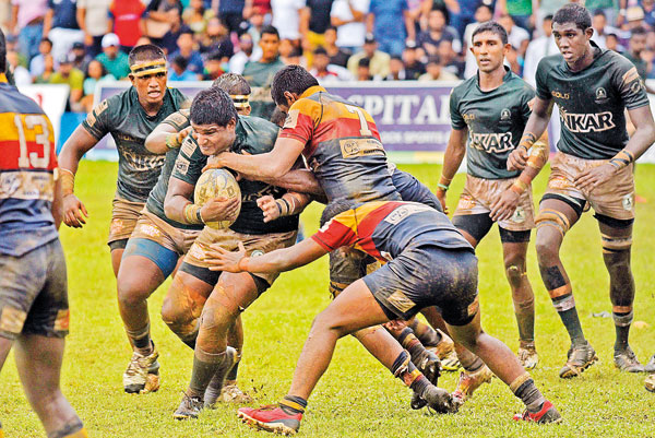 Down but never out. Isipathana fight back in the rain to keep perfect record alive